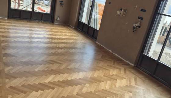 Posa parquet a spina a Brescia